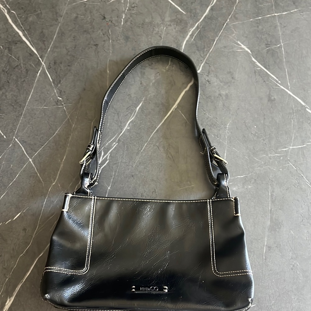 Cute girly bag would be really cute with a black mini bread and some black heels